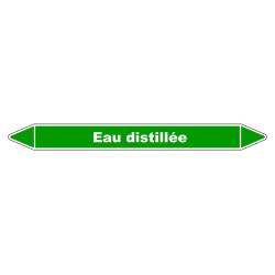 Marqueur de tuyauterie en vinyle laminé indiquant "Eau distillée" pour une identification claire.